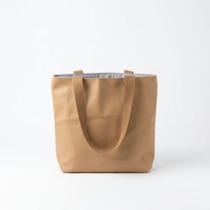 Kinyi Handbag in beige PU leather with long handles, spacious design and minimalist style
